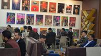 Des Irakiens au café "Forum du livre" à Mossoul, discutent littérature, musique, politique ou histoire, le 6 janvier 2018  [Ahmad MUWAFAQ / AFP]
