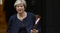 La Première ministre britannique Theresa May quittant la Chambre des Représentants après une session de questions, à Londres, le 18 octobre 2017 [NIKLAS HALLE'N / AFP]