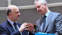 Le ministre français de l'Economie, Bruno Le Maire (d) , et le commissaire européen aux Affaires économiques, Pierre Moscovici (g), le 13 mars 2018 à Bruxelles [EMMANUEL DUNAND / AFP]