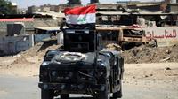 Un véhicule des forces irakiennes en patrouille près de la vieille ville de Mossoul, le 24 mai 2017 [Ahmad al-Rubaye / AFP/Archives]