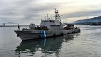 Un navire des gardes côtes grec à Lesbos, en février 2016 [ARIS MESSINIS / AFP/Archives]
