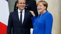 Le président français Emmanuel Macron et la chancelière allemande Angela Merkel à l'Elysée le 13 juillet 2017 à Paris [Patrick KOVARIK / AFP]
