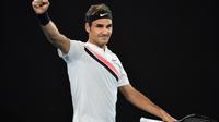 Le Suisse Roger Federer après sa victoire face à l'Allemand Jan-Lennard Struff à l'Open d'Australie, le 18 janvier 2018 à Melbourne [SAEED KHAN / AFP]