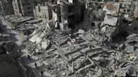 Vue de destructions dans la ville de Douma, dans la partie rebelle de la Ghouta orientale, près de Damas, le 5 mars 2018 [AMER ALMOHIBANY / AFP]