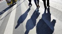 Des ombres de personnes [Attila Kisbenedek / AFP/Archives]