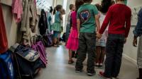 Des écoliers  en rang le jour de la rentrée scolaire le 3 septembre 2013 à Lyon  [JEFF PACHOUD / AFP/Archives]