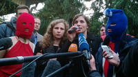 Nadejda Tolokonnikova (d) et Maria Alekhina des Pussy Riot répondent à la presse, le 20 février 2014, à Sotchi [Reuben Easey / AFP/Archives]