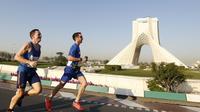 Des coureurs participent au premier marathon international à Téhéran, en Iran, le 7 avril 2017 [ATTA KENARE / AFP]