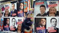 Affiches électorales des candidats à l'élection présidentielle le 9 avril 2017 à Paris [Gabriel Bouys / AFP/Archives]