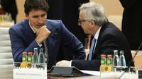 le Premier ministre canadien Justin Trudeau et le président de la Commission européenne Jean-Claude Juncker à Hambourg, en Allemagne, le 8 juillet 2017  [Markus Schreiber / POOL/AFP]