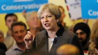 Theresa May, dans les West Midlands [Chris Radburn / POOL/AFP]