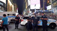 Des policiers à Times Square à New York le 1er juillet 2017 [LOIC VENANCE / AFP/Archives]