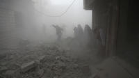 Des habitants de la Ghouta fuient leurs habitations pour échapper au frappe du régime. 