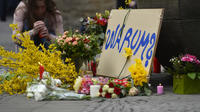 Des fleurs ont été déposées sur les lieux du drame, à Münster, le 8 avril 2018.