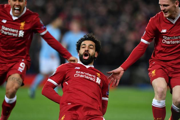 Le milieu de terrain de Liverpool Mohamed Salah (C)ouvre le score lors de la réception de Manchester City en Ligue des champions le 4 avril 2018 [Anthony Devlin / AFP]