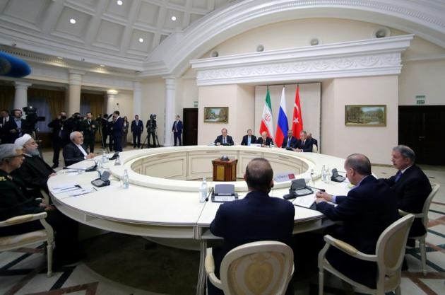 Rencontre trilatérale sur la Syrie entre le président russe Vladimir Poutine et ses homologues turc Recep Tayyip Erdogan et iranien Hassan Rohani  le 22 novembre 2017 à Sotchi, dans le sud-ouest de la Russie. [Mikhail KLIMENTYEV / SPUTNIK/AFP]