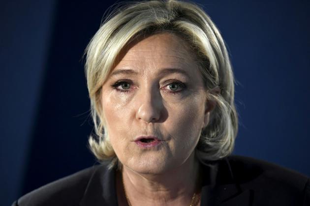 Marine Le Pen fait une déclaration sur le terrorisme à son QG de campagne le 21 avril 2017 [Lionel BONAVENTURE / AFP]
