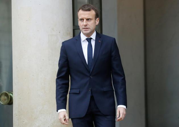 Le président Emmanuel Macron sur le terron de l'Elysée, le 22 décembre 2017 à Paris [PATRICK KOVARIK / AFP]
