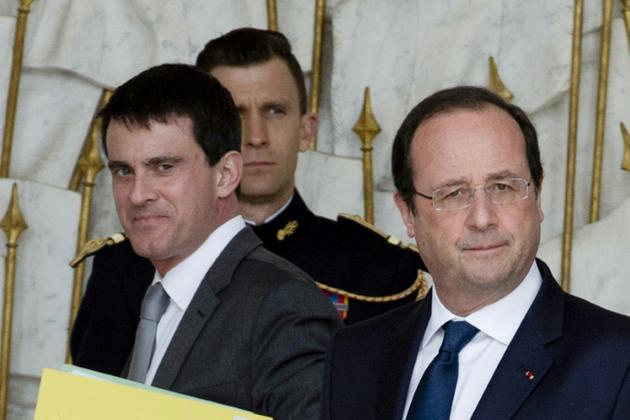 Manuel Valls (g) et François Hollande, à l'Elysée, le 19 mars 2014 [ALAIN JOCARD / AFP/Archives]