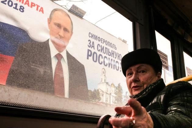 Affiche électorale en faveur de Vladimir Poutine pour l'élection du 18 mars  [STRINGER / AFP]
