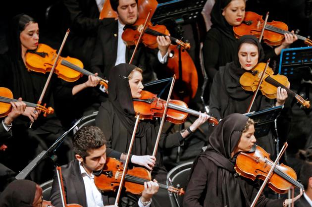 L'orchestre symphonique de Téhéran célèbre cette année son 80e anniversaire après avoir traversé des temps difficiles dans le sillage de la révolution de 1979 lorsque la musique -- de surcroît occidentale -- était bannie.  [ATTA KENARE / AFP]