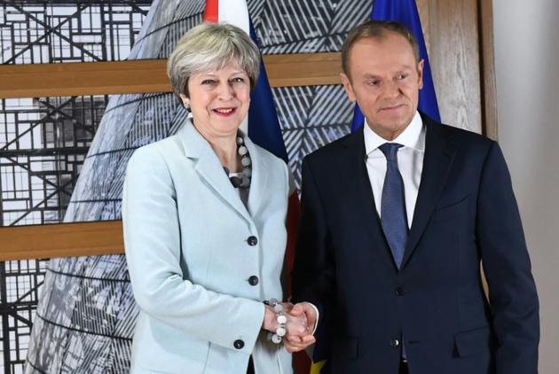 La Première ministre britannique Theresa May est reçue par le président du Conseil européen Donald Tusk, à Bruxelles le 8 décembre 2017   [EMMANUEL DUNAND / AFP/Archives]