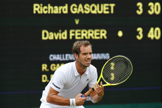 Le Français Richard Gasquet face à l'Espagnol David Ferrer au 1er tour à Wimbledon, le 4 juillet 2017 [Adrian DENNIS / AFP]