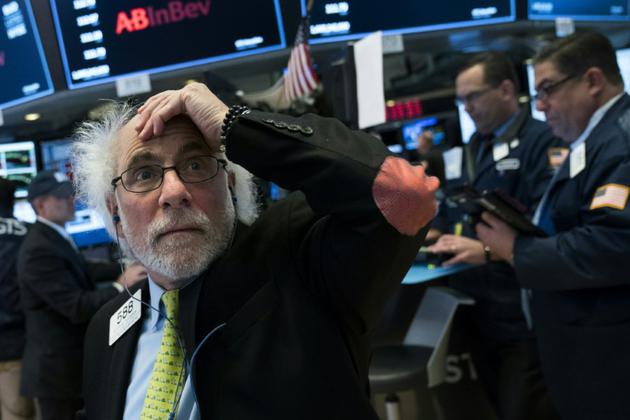 Traders sur le New York Stock Exchange le 2 février 2018  [Drew Angerer / GETTY IMAGES NORTH AMERICA/AFP/Archives]