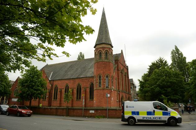 Un fourgon de police devant la mosquée de Didsbury à Manchester, le 24 mai 2017 [Oli SCARFF                           / AFP]