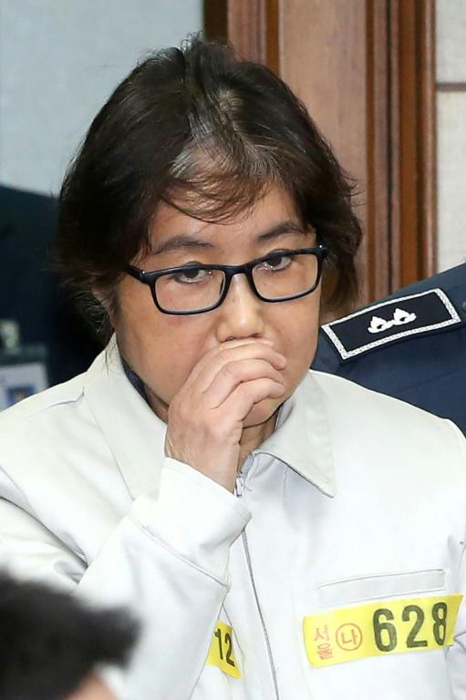Surnommée "Raspoutine" par les médias sud-coréens pour l'influence qu'on lui prêtait sur l'ex-présidente, Choi Soon-Sil, photographiée ici le 19 décembre 2016, a été condamnée à 20 ans de prison [KOREA POOL / KOREA POOL/AFP/Archives]