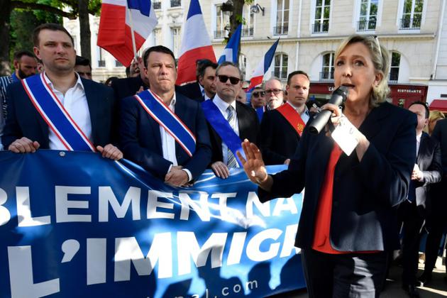 La présidente du FN, Marine Le Pen, lors d'un rassemblement de son parti contre la politique du gouvernement sur l'immigration le 20 avril 2018 à Paris [GERARD JULIEN / AFP]