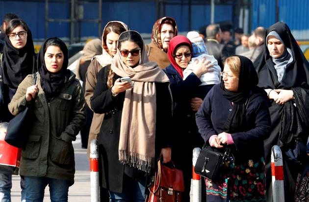 Des Iraniennes dans une rue de Téhéran, le 7 février 2018 [ATTA KENARE / AFP]