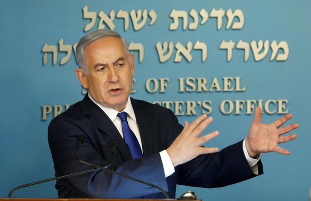 Le Premier ministre israélien Benjamin Netanyahu annonçant un accord avec l'ONU sur des migrants africains, le 2 avril 2018 à Jérusalem [Menahem KAHANA / AFP]