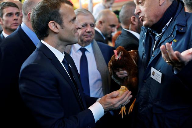 Le président Emmanuel Macron lors de sa visite au 55e Salon de l'Agriculture à Paris, le 24 février 2018 [Thibault Camus / POOL/AFP]