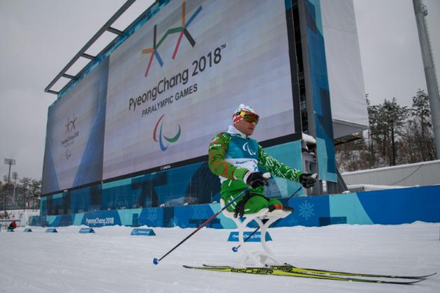 Un athlète lors d'une séance d'entraînement en vue des épreuves de biathlon et de ski nordique aux Jeux Paralympiques, le 9 mars à Pyeongchang [Ed JONES / AFP]