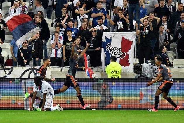 Benjamin Moukandjo fête un but pour Lorient contre Lyon, le 8 avril 2017 au Parc OL [ROMAIN LAFABREGUE / AFP]