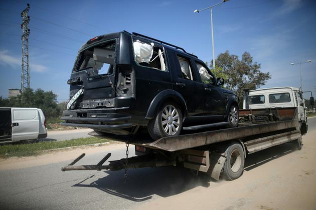 Photo d'une des voitures du convoi du Premier ministre palestinien Rami Hamdallah, victime d'une explosion à son entrée dans la bande de Gaza, le 13 mars 2018 [MOHAMMED ABED / AFP/Archives]