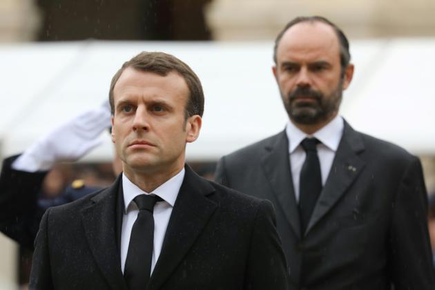 Emmanuel Macron et le premier ministre Edouard Philippe lors des cérémonies nationales en hommage au colonel Arnaud Beltrame, le 28 mars 2018 à Paris  [ludovic MARIN / POOL/AFP/Archives]