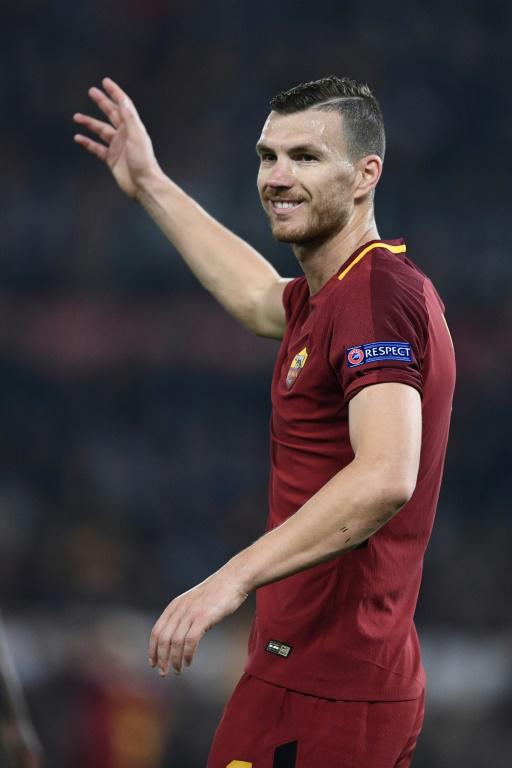 L'attaquant de l'AS Rome Edin Dzeko buteur lors du quart de final retour face au FC Barcelone le 10 avril 2018  [Filippo MONTEFORTE / AFP]