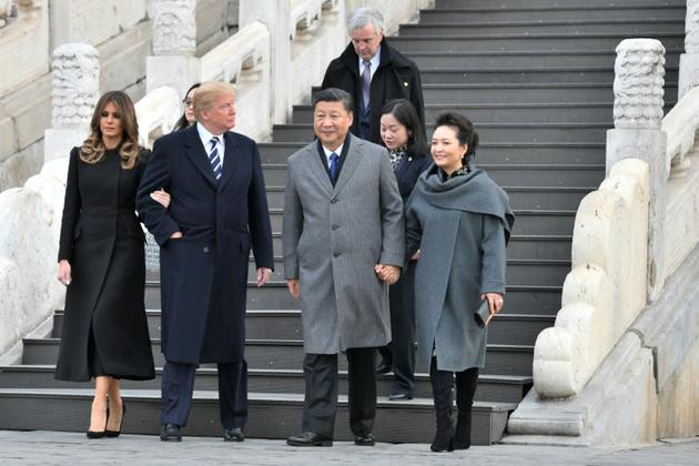 Le président américain Donald Trump et sa femme Melania visitent en compagnie du président chinois Xi Jinping et son épouse Peng Liyuan, la Cité interdite, le 8 novembre 2017 à Pékin [Jim WATSON / AFP]